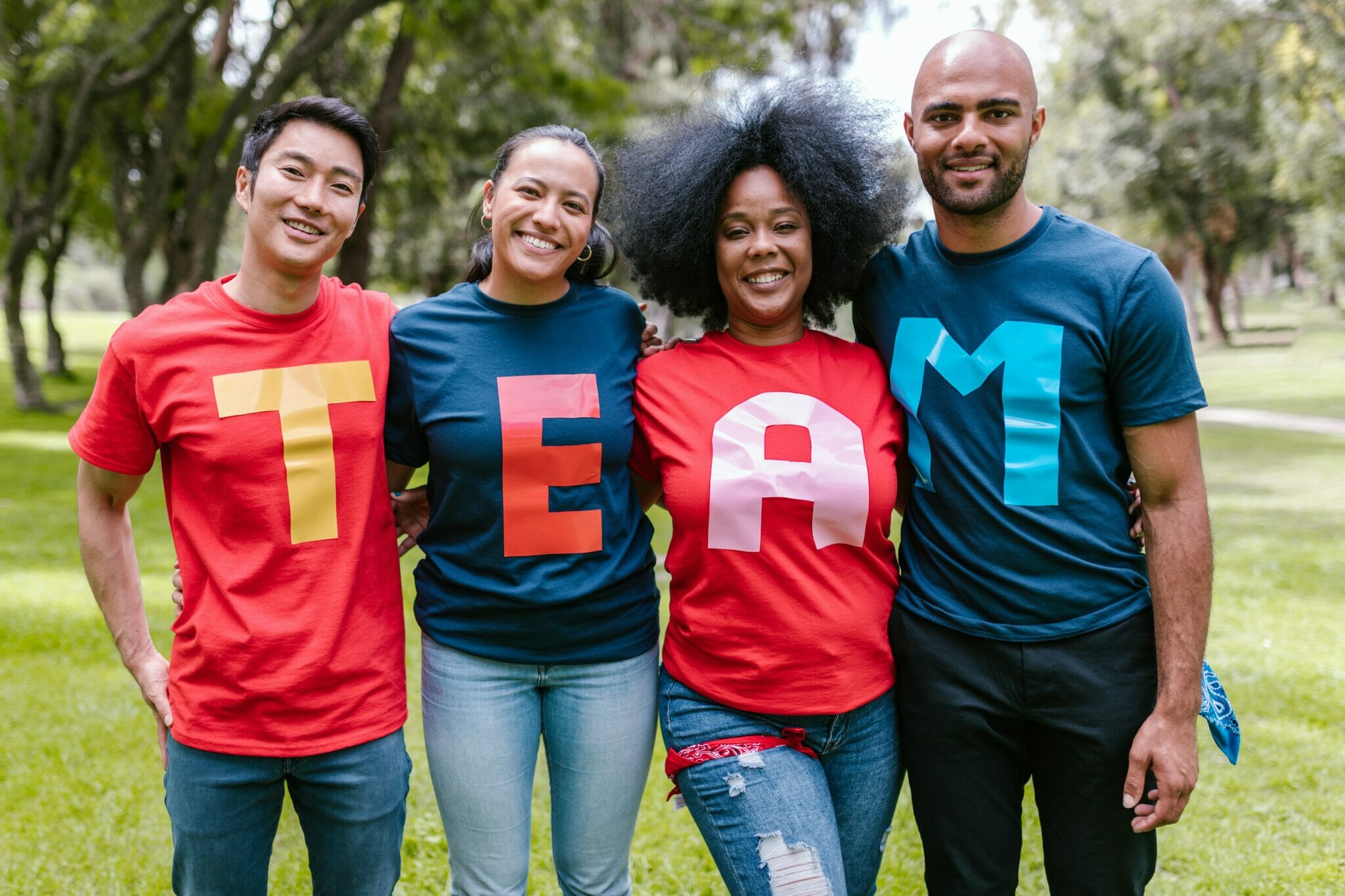 People with TEAM on their shirts.