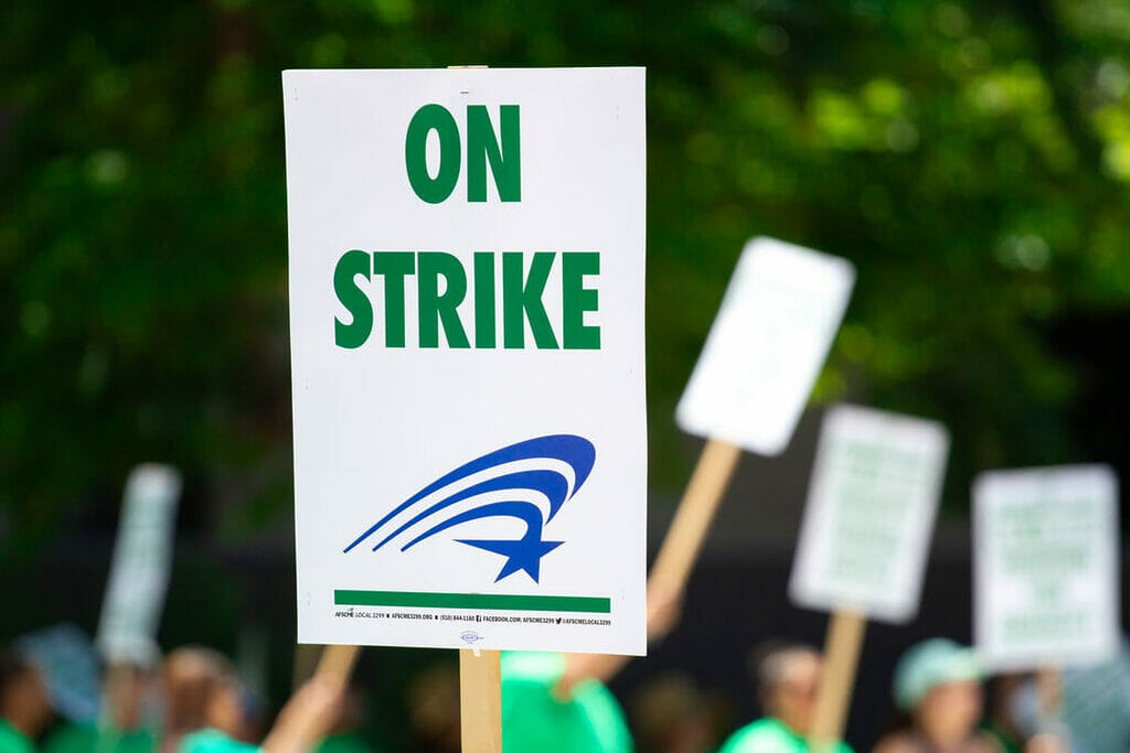 Protest sign that says "On Strike."