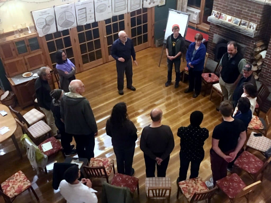 A group of people in a circle taking part of a sociocracy workshop by Jerry Koch-Gonzalez