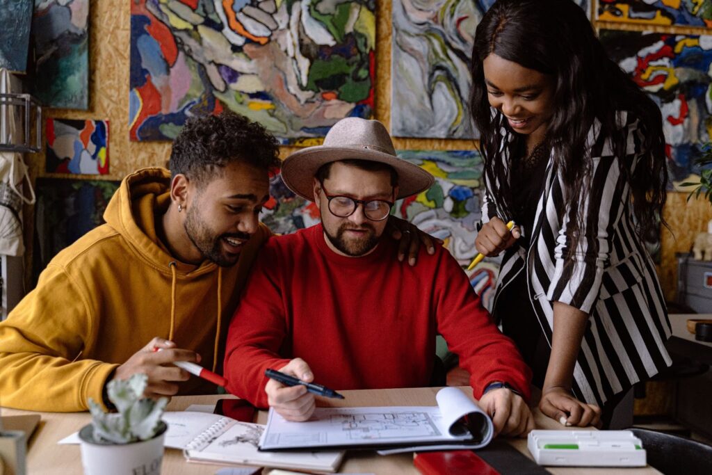 3 people watching some planning - Sociocracy For All